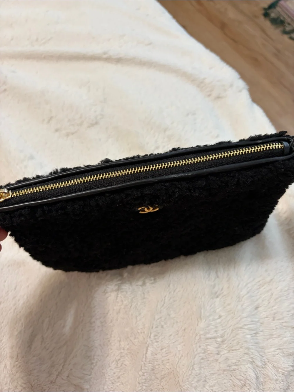 CHANEL Black Shearling Phone Case with Gold CC Emblem